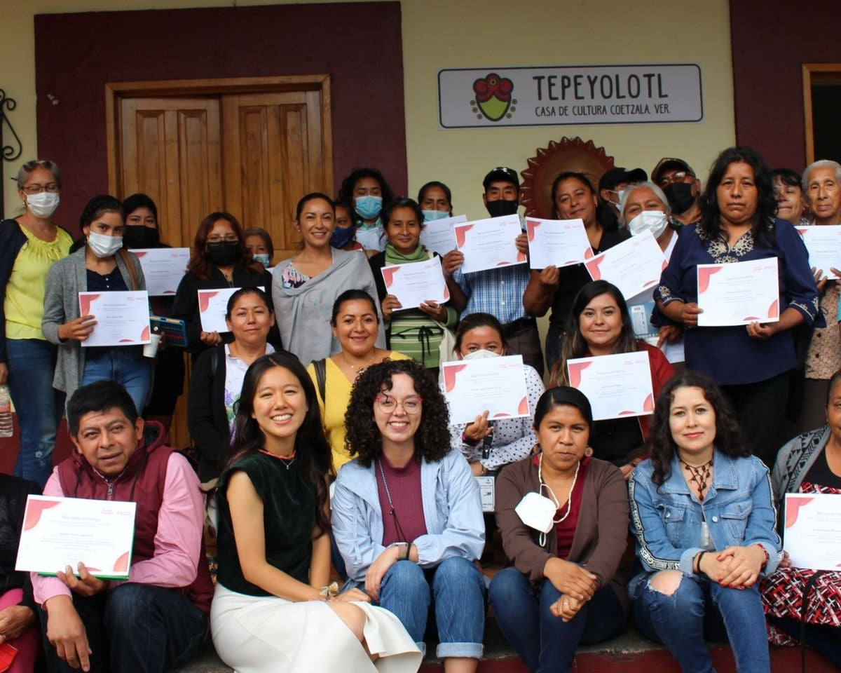 Empowering women in coffee: a photo celebrating program graduates, inspiring commitment to Central American producers.